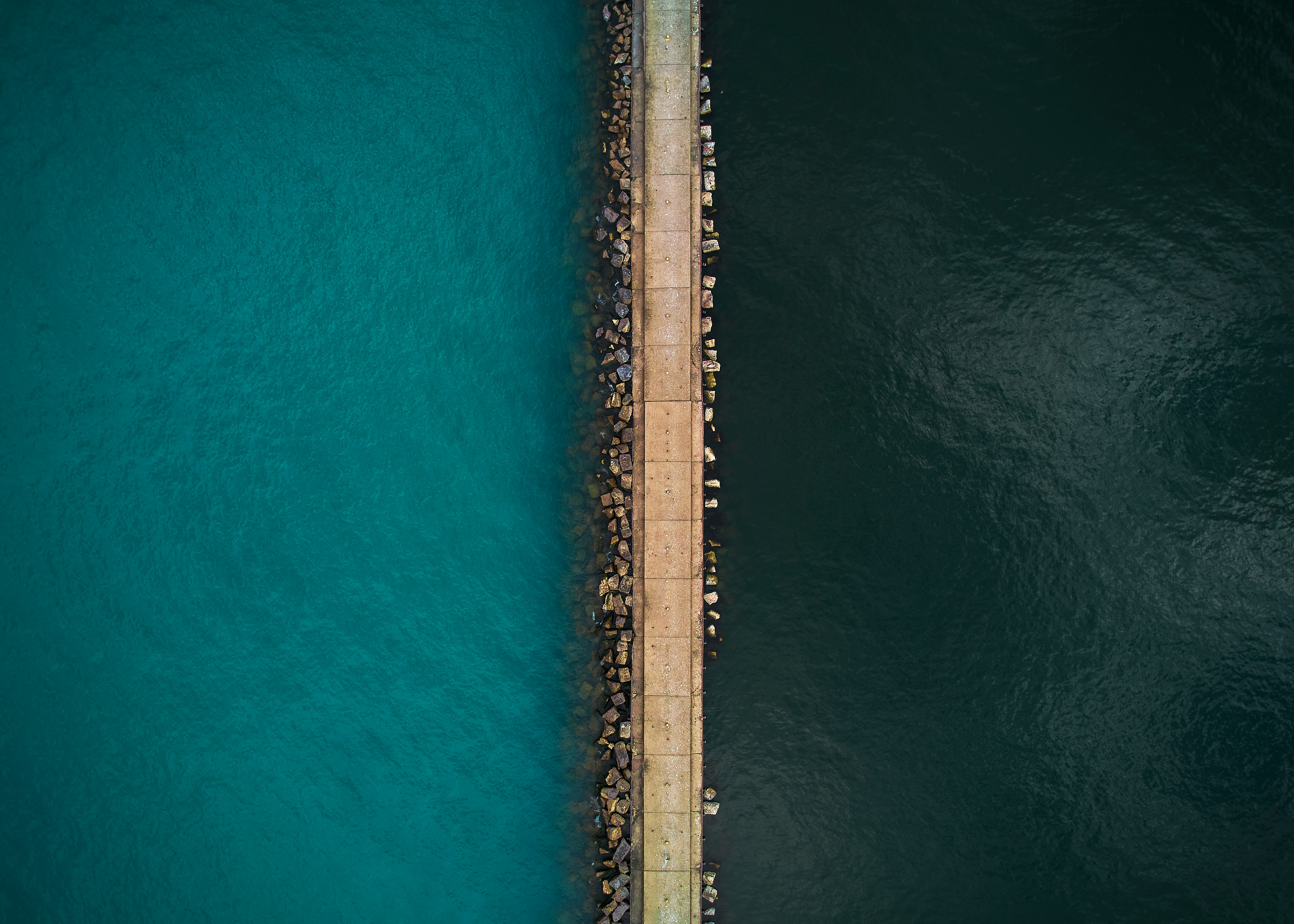 aerial view of bridge over the sea